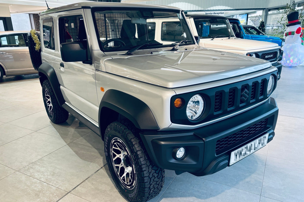 Silver Suzuki Jimny fitted with Magpie wheels in Satin Black with Machined Face