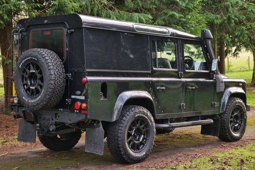 Black Land Rover Defender Classic fitted with Matte Black EVO Corse DakarZero wheels